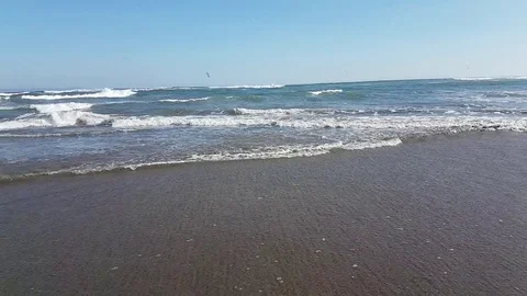 Waves splash on the shore of the island of Bali Stock Footage 93409643