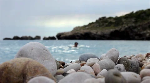 Waves splashed pebbly beach Stock Footage 1019463