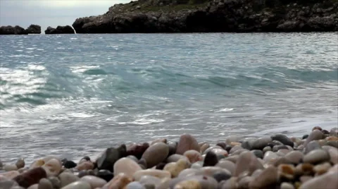 Waves splashed pebbly beach Stock Footage 1019488