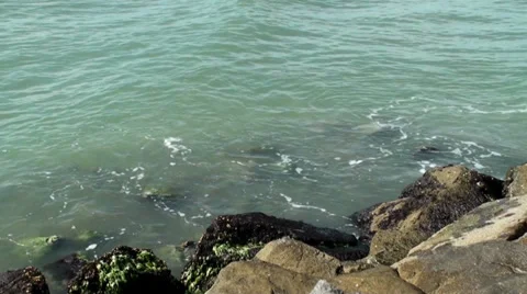 Waves Splashing Against The Rocks Stock Footage 33320143