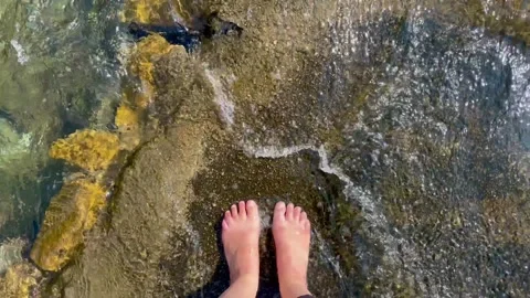 Waves splashing against rocks Stock Footage 316717026