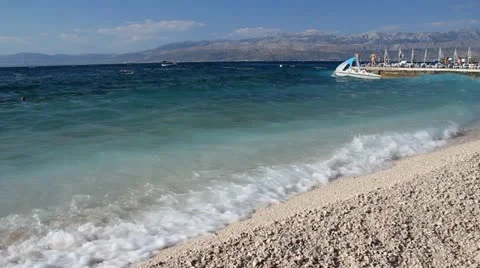 Waves splashing the beach Stock Footage 11631429