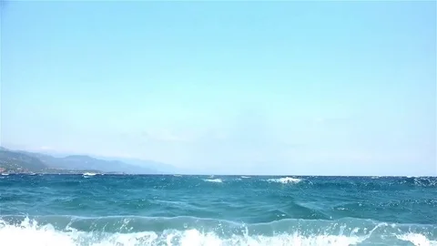Waves splashing the beach in windy weather Stock Footage 83503549