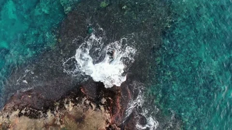 Waves splashing on the cliff Stock Footage 130433662