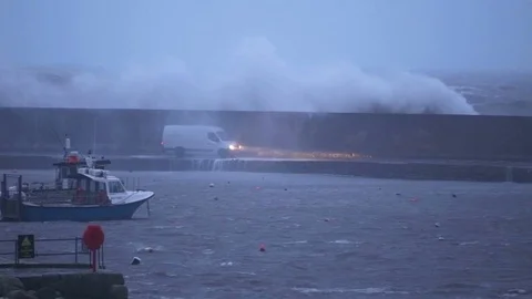 Waves splashing on The Cobb Stock Footage 121239896