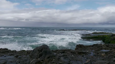 Waves Splashing Over Rocks Stock Footage 135164820