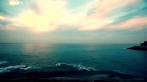 Waves splashing on the rocks at the coast line in beautiful morning Stock Footage 57039325