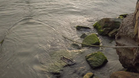 Waves splashing on the rocks at the coast line Stock Footage 271211408