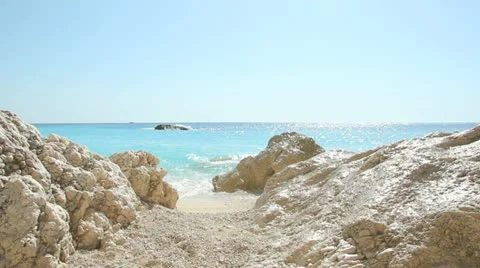 Waves splashing on rocks Stock Footage 11599579