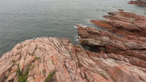 Waves splashing rocks - slow motion Stock Footage 88157535