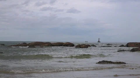 Waves splashing on rocky shore static Stock Footage 29960891