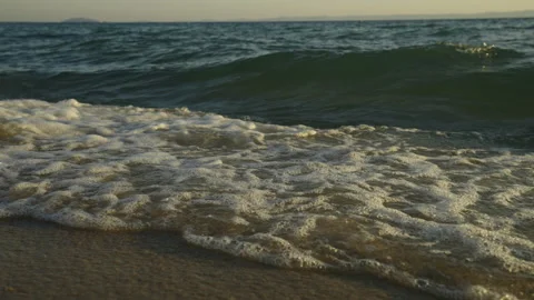 Waves splashing on sand at Beach Video stock 212960070