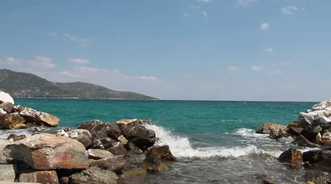 Waves splashing into sea wall Video stock 30710345