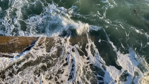 Waves splashing on a sea wall Stock Footage 171140824
