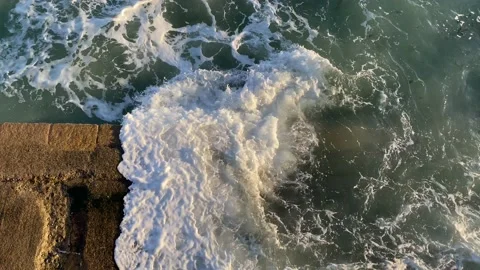 Waves splashing on a sea wall Stock Footage 171140841