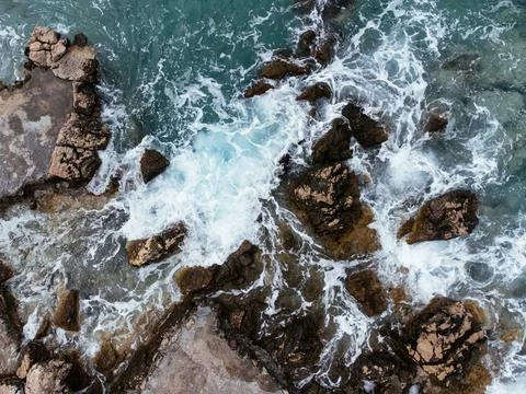 Waves splashing the seashore. Stock Photos