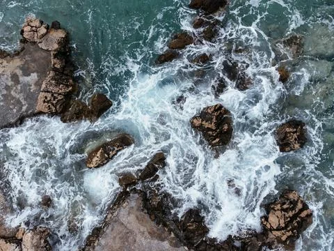 Waves splashing the seashore. Stock Photos