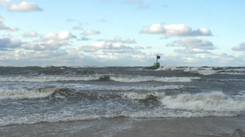 Waves Splashing into Shore and Lighthouse In Heavy Storm Stock Footage 132974236