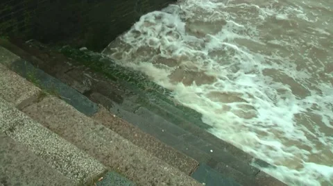 Waves splashing on steps Stock Footage 8781736