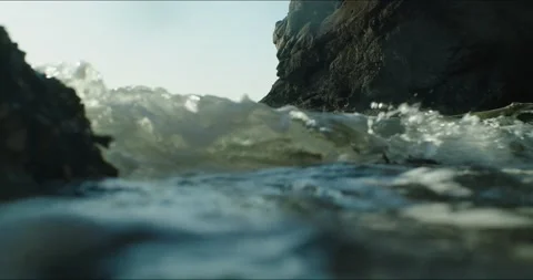Waves splashing through Pacific Coast inlet Stock Footage 152994378