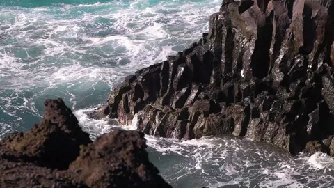 Waves splashing on volcanic rocks, Lanzarote, Canary Islands. Slow motion, HD Stock Footage 168346271