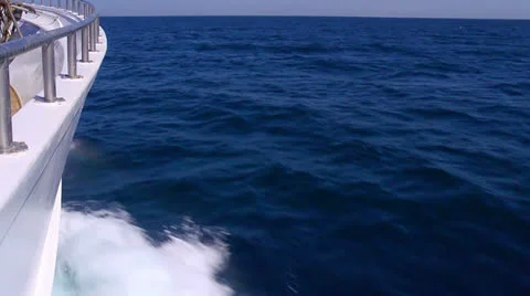 Waves from stem of sailing ship Stock Footage 26846413