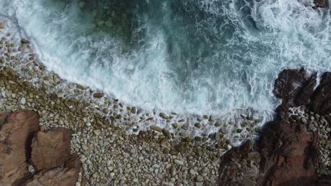 Waves in stones beach, closeup vertical view Stock Footage 160556905