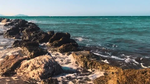 Waves at storm in Mediterranean Sea beating on breakwater on Kos Greece Stock Footage 119984232