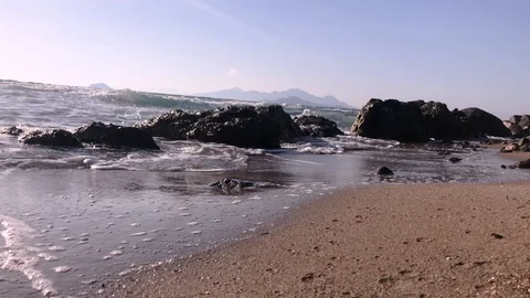 Waves at storm in Mediterranean Sea beating on breakwater on Kos Greece Video stock 119984443