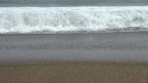 Waves that strike the coast. Slow motion video Stock Footage 88940292