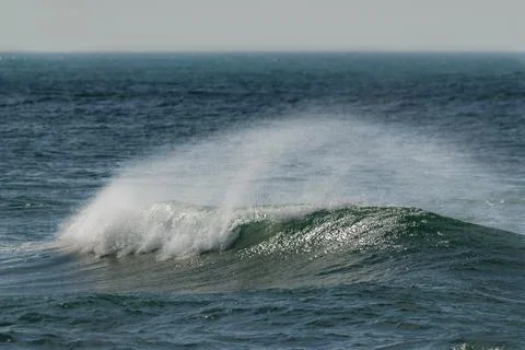 Waves with strong wind after a storm, Patagonia, Argentina. Stock Photos