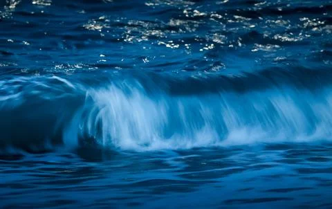 Waves with strong wind after a storm, abstract texture, Patagonia, Argentina. Stock Photos