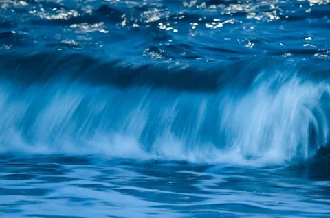 Waves with strong wind after a storm, abstract texture, Patagonia, Argentina. Stock Photos
