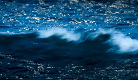 Waves with strong wind after a storm, abstract texture, Patagonia, Argentina. Stock Photos