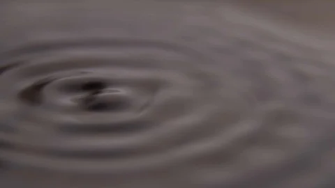 Waves Subwoofer Audio Speaker Vibrations and Black Water Liquid Stock Footage 128745567