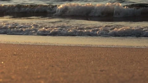 Waves at sunrise Video stock 201168897