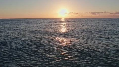 Waves at sunrise on a paradise beach. Video stock 221555336