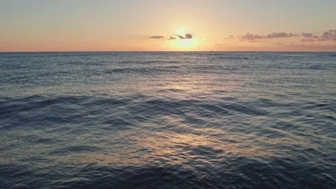 Waves at sunrise on a paradise beach. Stock Footage 223560348