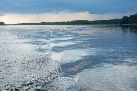 Waves at sunset abstract background Stock Photos