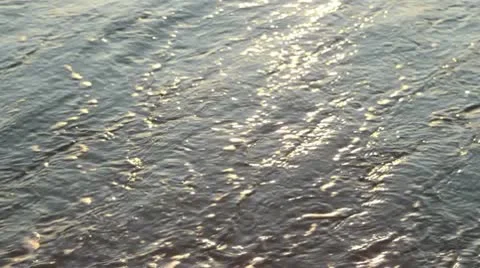 Waves at sunset Stock Footage 10573116