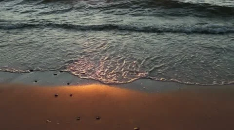 Waves at sunset Stock Footage 10573914