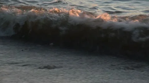 Waves at sunset Stock Footage 11133033