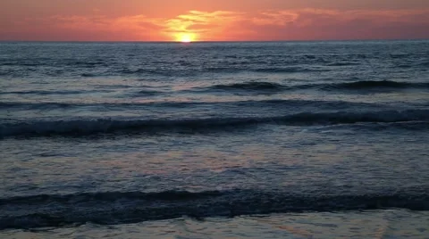 Waves at the sunset Stock Footage 55578553