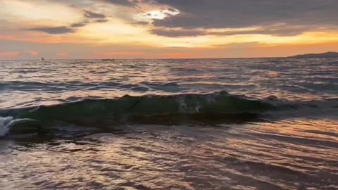 Waves on the  sunset Stock Footage 165707179