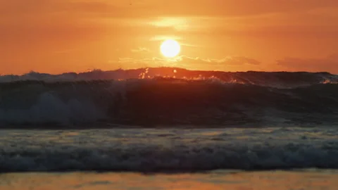 Waves at sunset Stock Footage 218444481
