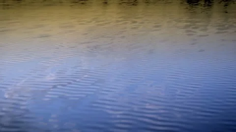 Waves sunset lake Stock Footage 12142359