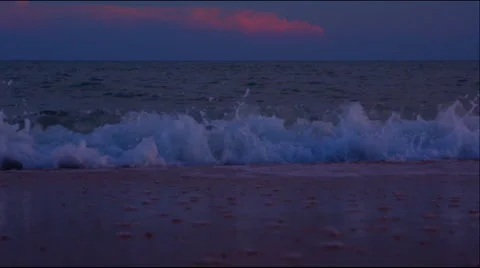 Waves on sunset shot in slow motion Stock Footage 51147678