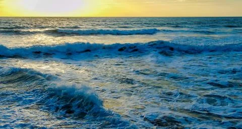 Waves on the sunsut Stock Photos