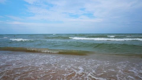 The waves of the surf and the sandy beach Stock Footage 247844682