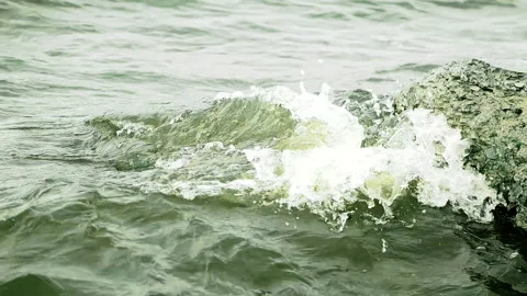 Waves on the surface of the dark green water in the river. Media. Natural Stockbeeldmateriaal 167349892